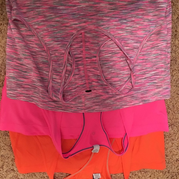 10 tank workout shirts. Like new, all colors. XL - Picture 2 of 3